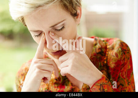 Girl with blocked sinuses Stock Photo