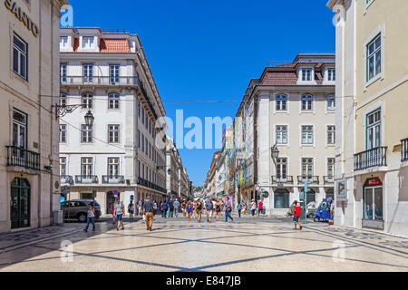 Rua Augusta Street in the Baixa District of Lisbon. The most cosmopolitan street of the capital is always full of people. Stock Photo