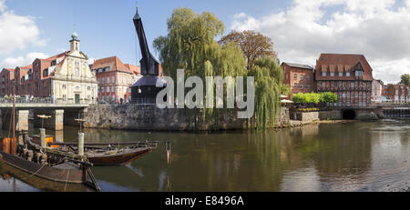 Harbour with River Ilmenau and Old Crane, Luneburg, Lower Saxony, Germany Stock Photo