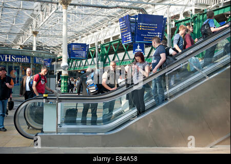 Passengers on an escalator in Edinburgh's Waverley Railway Station Stock Photo
