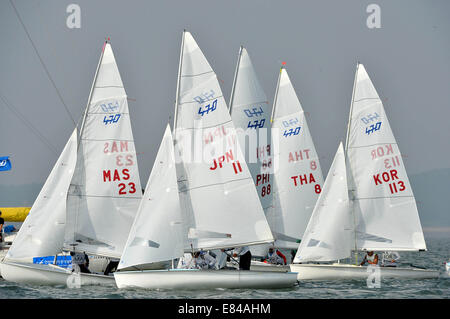 Incheon, South Korea. 30th Sep, 2014. Athletes compete during the 470 - men's two person dinghy match of sailing at the 17th Asian Games in Incheon, South Korea, Sept. 30, 2014. © Zhu Zheng/Xinhua/Alamy Live News Stock Photo