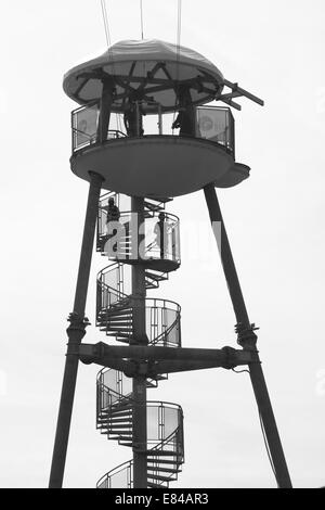 Climbing to the top of the launch tower - visitors are keen to try out the newly opened pier zipwire on Bournemouth Pier, Dorset Stock Photo