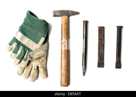 Different chisels, hammer and gloves. Stock Photo