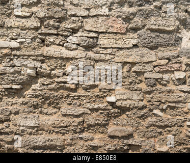 Old weathered stone wall background Stock Photo - Alamy