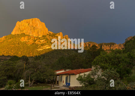 Sunset golden light on Casa Grande Mountain in the Chisos Mountains in Big Bend National Park. Stock Photo