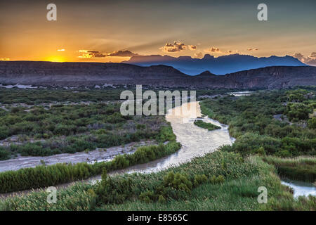 Sunset over Chisos Mountains with Rio Grande River in Big Bend National Park. Stock Photo