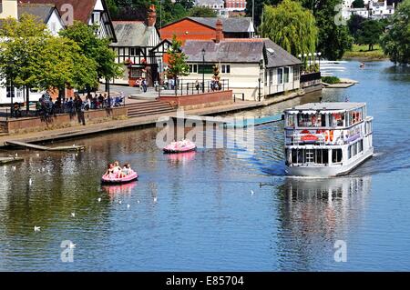 River ferry and pedalos on the River Dee, Chester, Cheshire, England, UK, Western Europe. Stock Photo