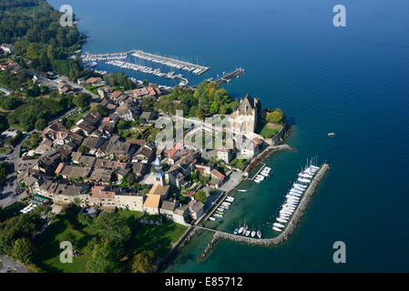 AERIAL VIEW. Picturesque medieval village on the lakeshore of Lake Geneva. Yvoire, Haute-Savoie, Auvergne-Rhône-Alpes, France. Stock Photo