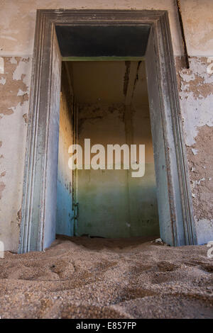 abandoned doorway in deserted town of Kolmanskopp Stock Photo