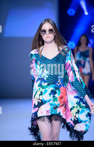 SYDNEY, AUSTRALIA - SEPTEMBER 27: A model showcases designs for Talulah on the runway during MB Presents Australian Style show at Mercedes-Benz Fashion Festival Sydney at Sydney Town Hall on September 27, 2014 in Sydney, Australia. Stock Photo