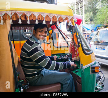 An auto rickshaw driver in Delhi India Stock Photo