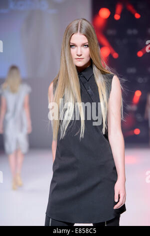 SYDNEY, AUSTRALIA - SEPTEMBER 27: A model showcases designs for Kahlo on the runway during MB Presents Australian Style show at Mercedes-Benz Fashion Festival Sydney at Sydney Town Hall on September 27, 2014 in Sydney, Australia. Stock Photo