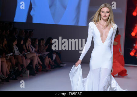 SYDNEY, AUSTRALIA - SEPTEMBER 27: A model showcases designs for Ae'lkemi on the runway during MB Presents Australian Style show at Mercedes-Benz Fashion Festival Sydney at Sydney Town Hall on September 27, 2014 in Sydney, Australia. Stock Photo