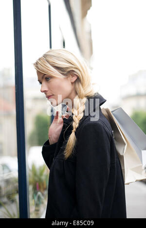 Woman window shopping Stock Photo