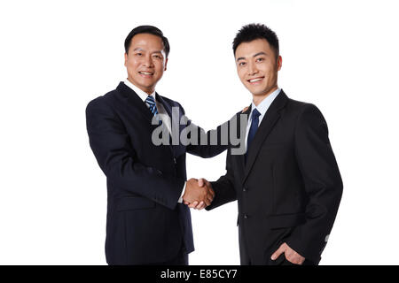 Businessmen shaking hands Stock Photo