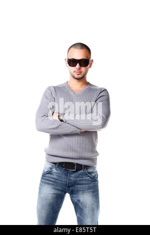 Casual friendly man in jeans and pullover - isolated over a white background Stock Photo