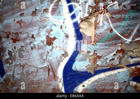 cracked obsolete vintage painted wall background Stock Photo
