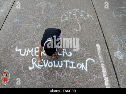 Hong Kong, China. October 1st, 2014. Pro-democracy demonstrators block main roads in Admiralty, Central District, as part of the Hong Kong's civil disobedience movement, widely referred as The Umbrella revolution Credit:  Boaz Rottem/Alamy Live News Stock Photo