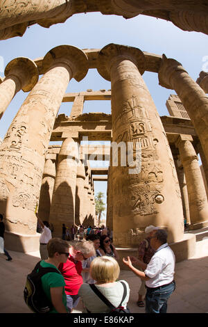 Egypt, Luxor, Karnak Temple, visitors amongst columns of Great Hypostyle Hall, fish eye wide angle distortion Stock Photo