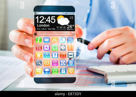 Smartphone (phablet) with a transparent display in human hands. Concept actual future innovative ideas and best technologies humanity. Stock Photo