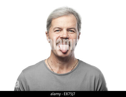 funny mature man shows tongue isolated on white background Stock Photo