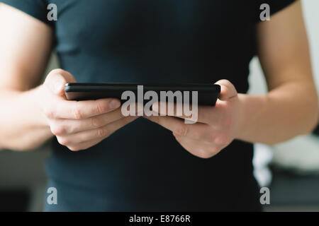 Man using digital tablet Stock Photo