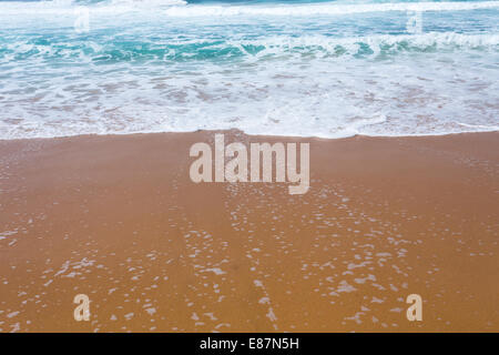 Beautiful clear mediterranean water lapping on the shore Stock Photo