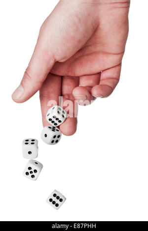 Rolling the dice - five dice falling from male hand isolated on white background Stock Photo