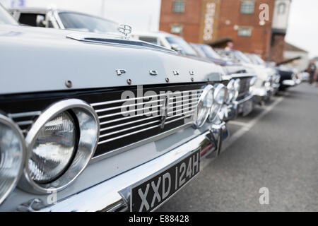 Classic Ford Zodiac motor car grill with badge in a row with other classic cars at  a rally on the Isle of Wight, England. Stock Photo