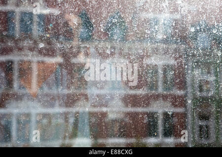 View through a dirty window pane, Lindener marketplace, Hanover, Lower Saxony, Germany, Europe, Blick durch eine schmutzige Fens Stock Photo