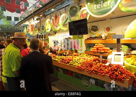 Rotterdam, Netherlands. 30th Sept, 2014. A fruit and vegetable stall in the Markthal Rotterdam in Rotterdam, the Netherlands. The covered market was designed by architects MVRDV and the interior bears the biggest artwork in the Netherlands, 'The Horn of Plenty' by Arno Coenen and Iris Roskam. The market was officially opened by Queen Maxima on 1 October 2014. Credit:  Stuart Forster/Alamy Live News