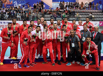 Incheon, South Korea. 2nd Oct, 2014. Bronze medalists players of Bahrain pose during the awarding ceremony of the men's handball contest at the 17th Asian Games in Incheon, South Korea, Oct. 2, 2014. Credit:  Ye Pingfan/Xinhua/Alamy Live News Stock Photo