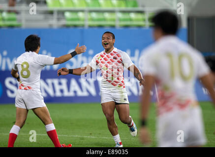 Incheon, South Korea. 2nd Oct, 2014. Players of Japan celebrate after the men's rugby final match against China's Hong Kong at the 17th Asian Games in Incheon, South Korea, Oct. 2, 2014. Japan won 24-12 and claimed the title. © Fei Maohua/Xinhua/Alamy Live News Stock Photo