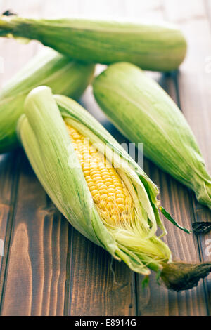 the sweet corn on wooden table Stock Photo