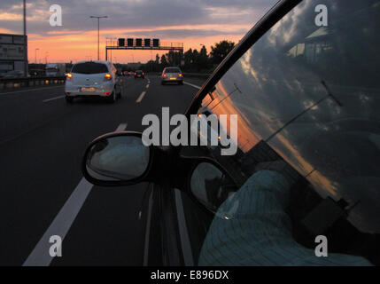 Berlin, Germany, car traffic on the A100 city motorway at dusk Stock Photo