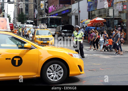 New York, USA, policeman directing traffic Stock Photo