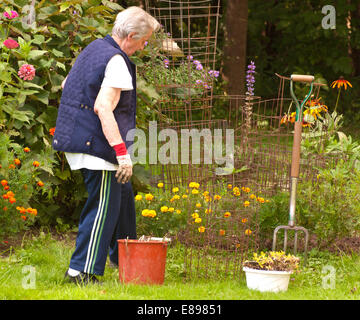 senior woman gardening Stock Photo