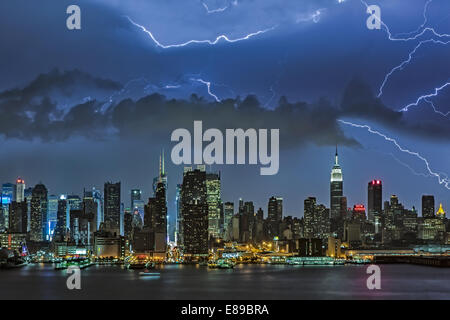 Thunder and Lightning storms over the New York City skyline. Stock Photo