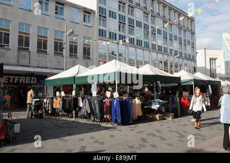 Shoppers on the Moor in Sheffield England, with outdoor market stalls. Stock Photo