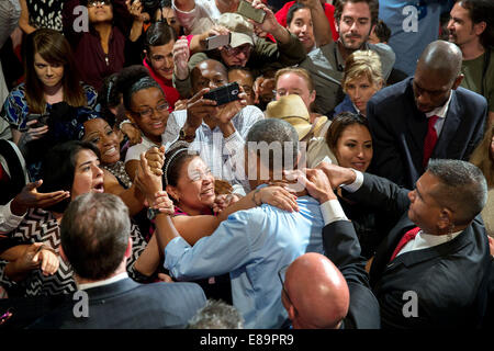 President Barack Obama greets audience members after he delivers remarks on the economy at the Paramount Theatre in Austin, Texas, July 10, 2014. Stock Photo