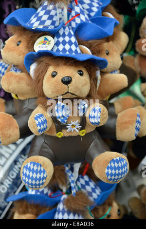 Teddy bear in traditional Bavarian dress on a stall, Oktoberfest, Munich, Upper Bavaria, Bavaria, Germany Stock Photo