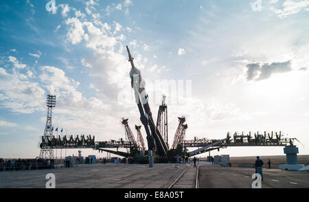The Soyuz TMA-14M spacecraft is raised into position on the launch pad Sept. 23, 2014 at the Baikonur Cosmodrome in Kazakhstan. Launch of the Soyuz rocket is scheduled for Sept. 26 and will carry Expedition 41 Soyuz Commander Alexander Samokutyaev of the Stock Photo