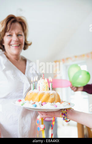 Family celebrating birthday party Stock Photo