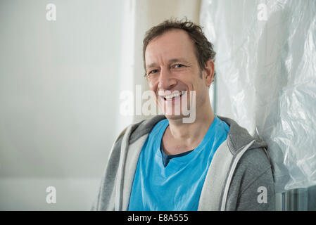 Portrait of man at construction site of new building Stock Photo