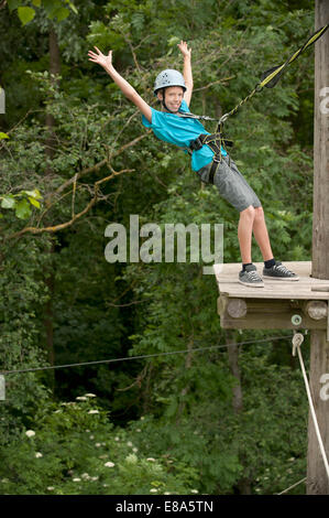 Portrait of boy climbing crag, smiling Stock Photo