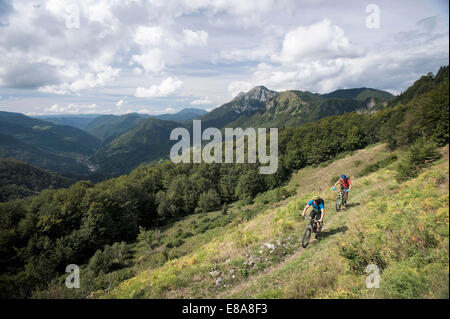 two mountain bikers on the way, Slatnik, Istria, Slovenia Stock Photo