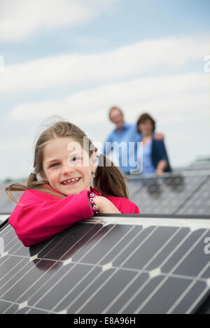 Young girl portrait photo-voltaic panel solar Stock Photo