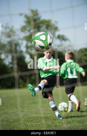 Young junior soccer kids practicing penalty Stock Photo