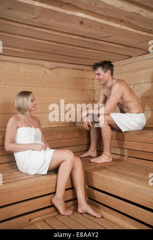Man and woman in a sauna Stock Photo