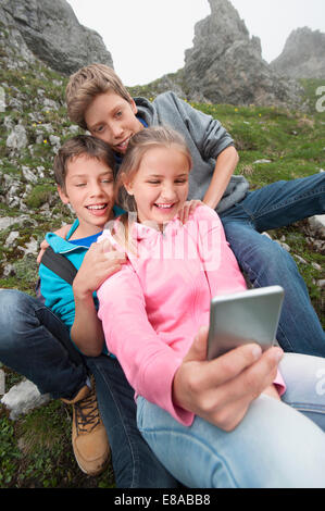 Girl and teenage boys self-portrait cell phone Stock Photo